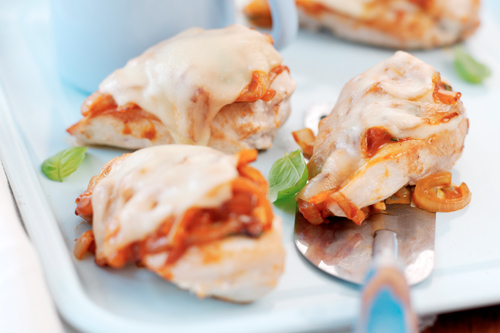Breast of Chicken with Tomatoes, Onions and Basil, Topped with Melting Cheese
