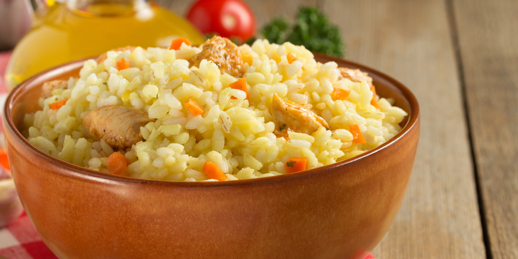 Chicken risotto with carrots and chicken soup