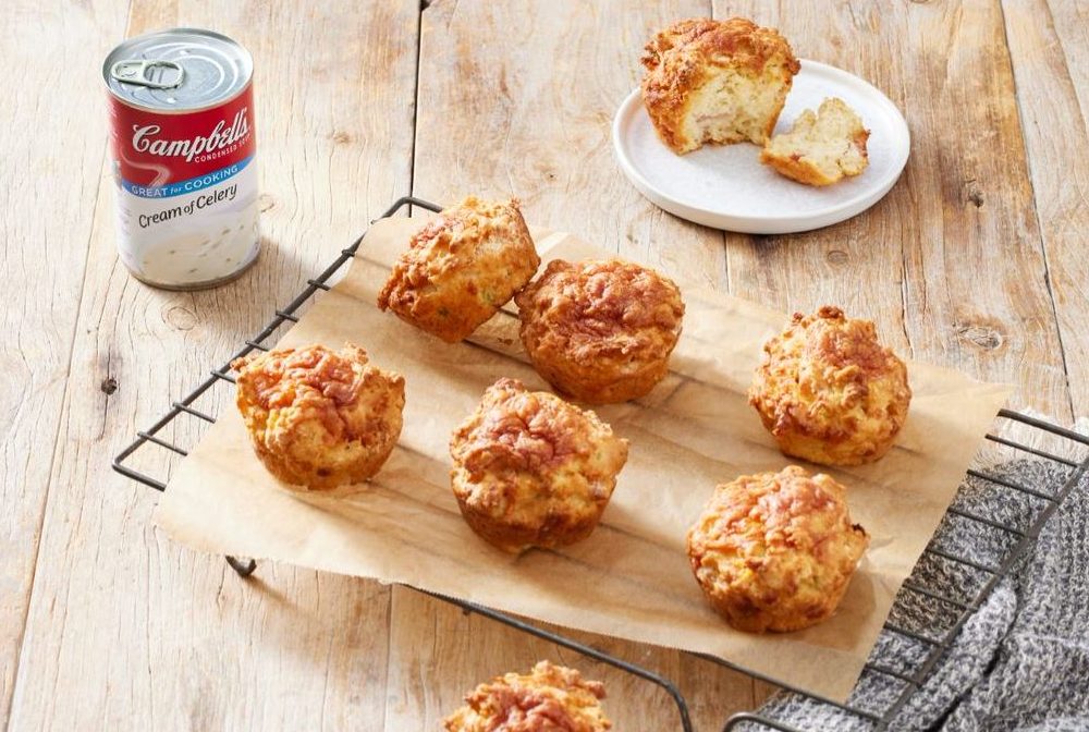 campbells-muffin image of savoury muffins on a cooling rack by can of Campbell's Soup
