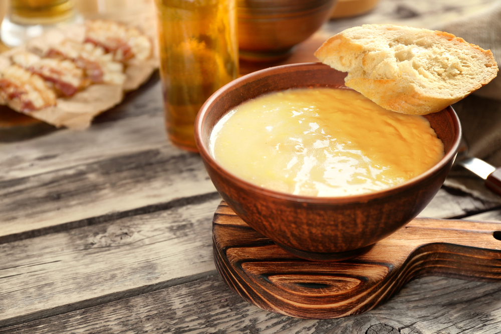 bowl of beer soup with a beer