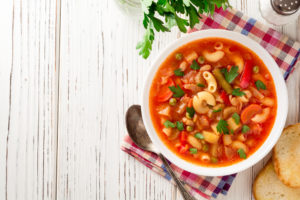 pasta in a bowl of tomato soup